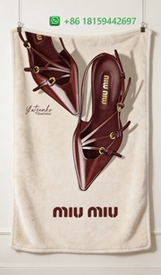 Miumiu Throw Blankets